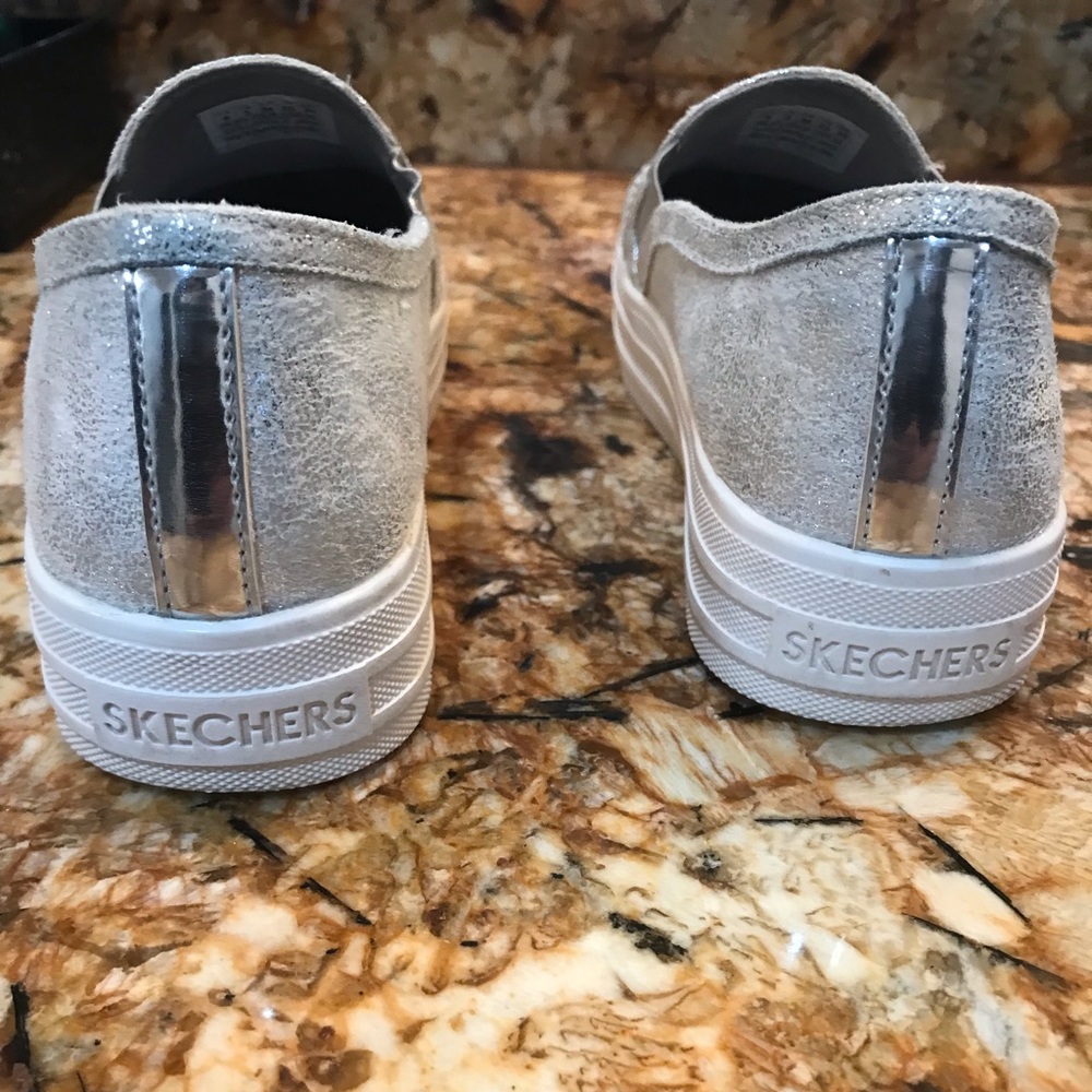 Skechers memory foam rise platform sneakers.